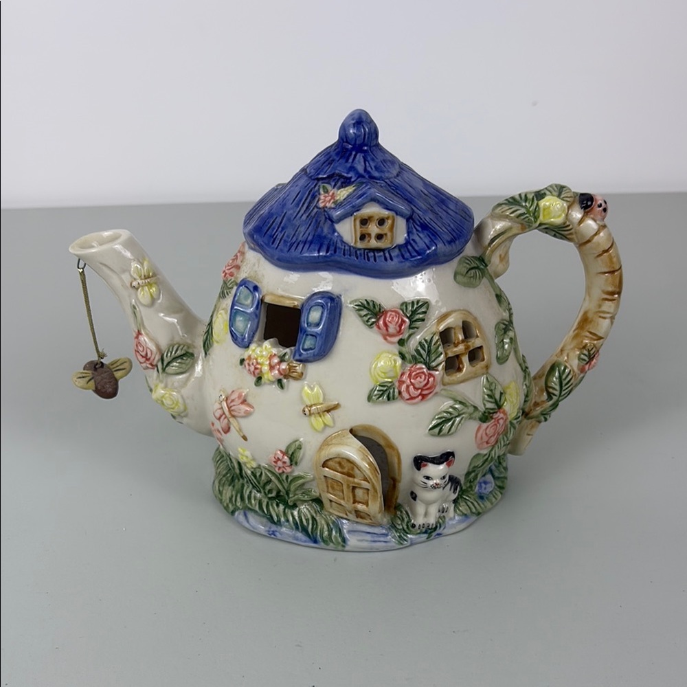 Charming Cottage Teapot Candle Holder with Floral Design